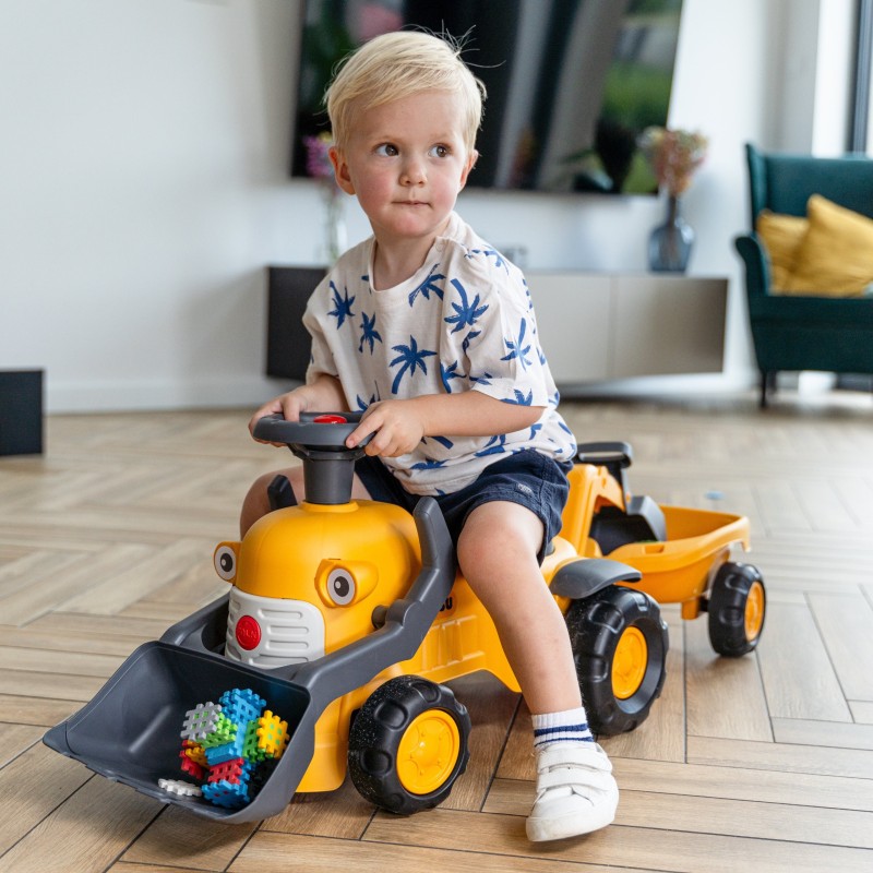 Falk Detské odrážadlo traktor Komatsu – S bagrom a vlečkou pre najmenších