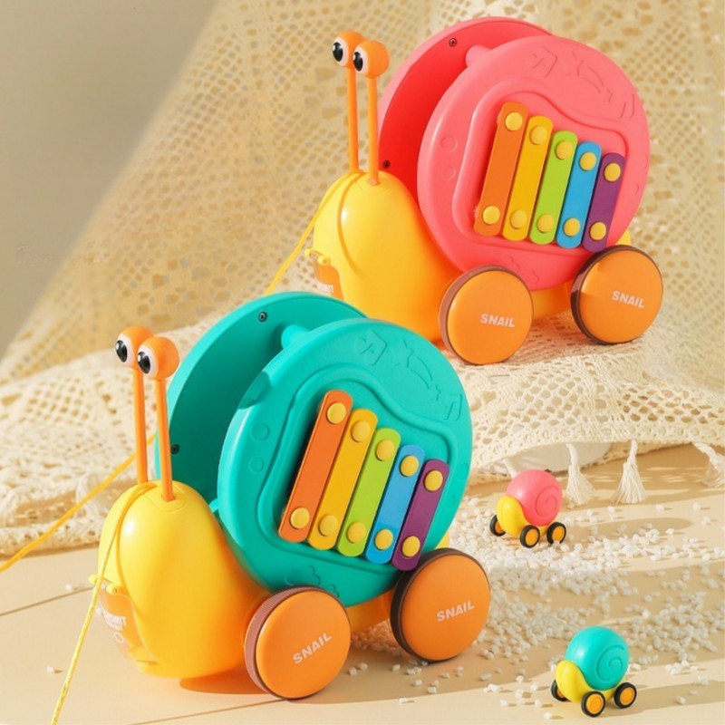 WOOPIE Ślimak do Ciągnięcia 4w1 Cymbałki Zębatki Sensoryczne Wyrzutnia + Małe Autko